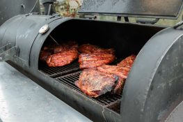 Bbq grill oven with meat on grill